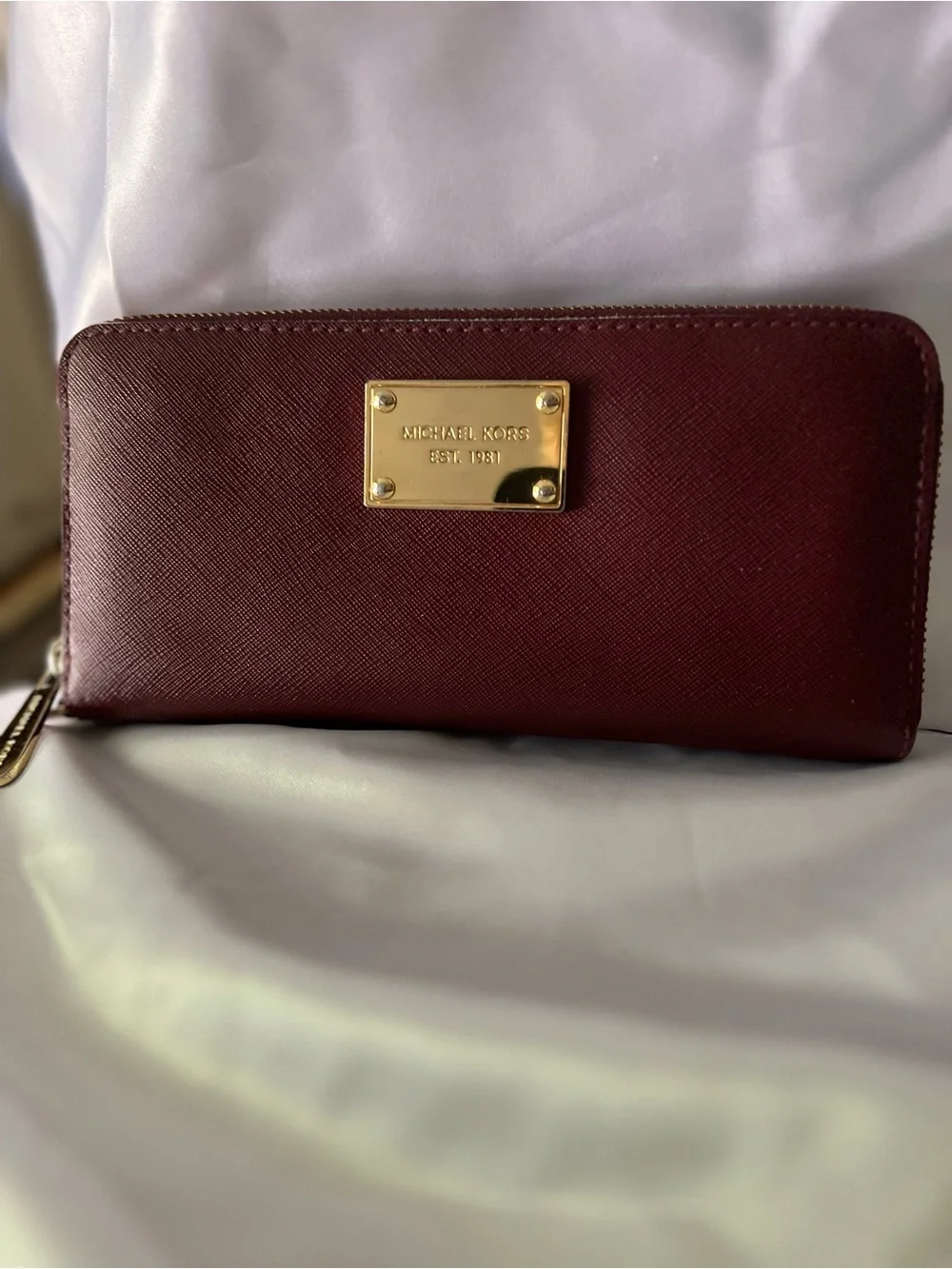 Michael Kors Maroon Saffiano Zip-Around Wallet with Gold Plaque